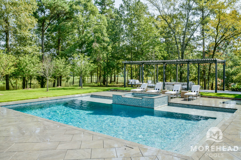 Outside cover and geometric pool in backyard