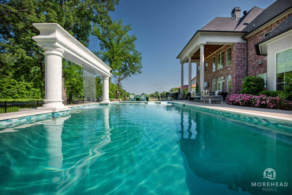 waterfall between two white pillars | Morehead Pools